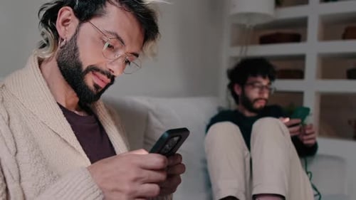 Gay Couple Relaxing at Home Together