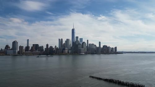Manhattan View From Top Forwards Fly Above Street Between Modern Buildings Day in Manhattan NYC