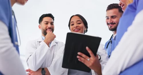 Healthcare, tablet and team of doctors and nurses talking and analyzing patient data or results