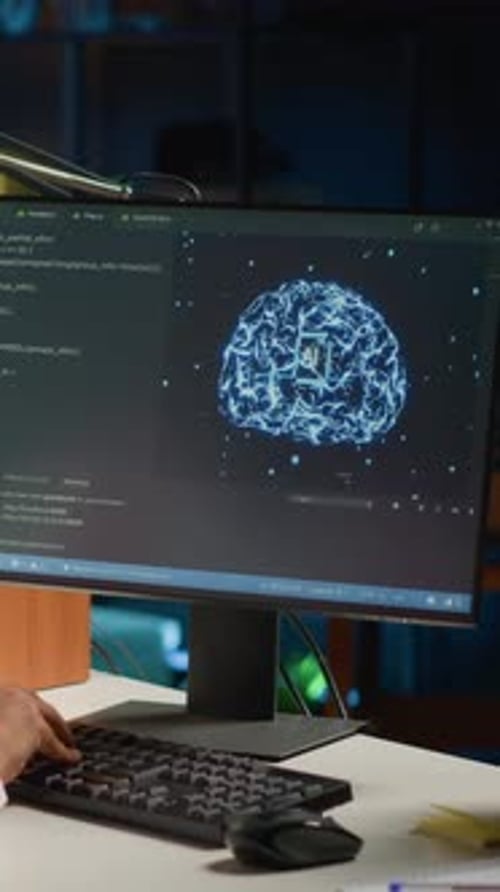 Person Coding, Brain Graphic on Computer