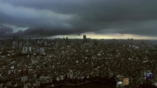 Drone, city and traffic by buildings, sky or transportation with infrastructure