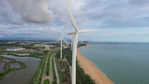 Drone Shot of Wind Turbines Turning . Wind Power, Alternative Energy