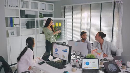 Group of young businessman and businesswoman working in the office.