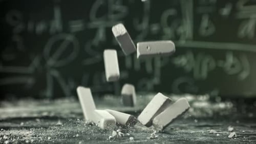 School Chalk Falls on the Desk Filmed on a Highspeed Camera at 1000 Fps