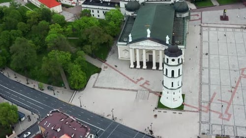 Vilnius Cathedral Square - Cars Driving In The Road In Front Of Vilnius Cathedral And Bell Tower In