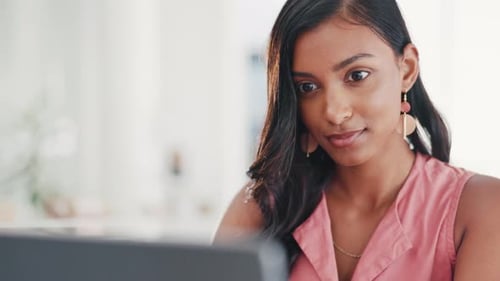 Business woman, laptop and serious typing in schedule planning, strategy