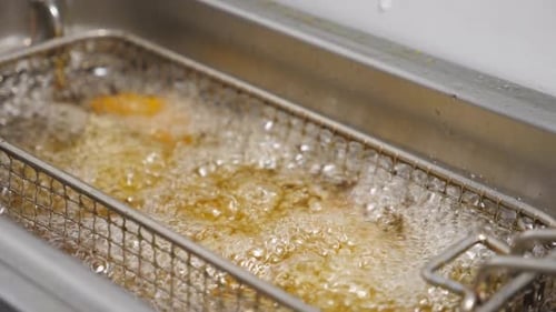 Deep Frying Food in Hot Oil Close Up
