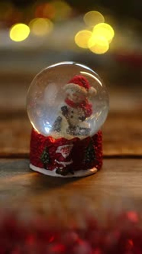Vertical Video Christmas Background with Cozy Atmosphere Christmas Snow Globe
