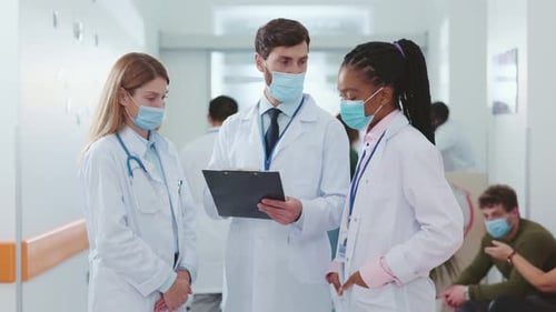 The Medical Team Engaged in Comprehensive Discussion About Patient Care Within a Hospital Setting