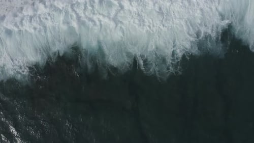Waves in the Ocean Top View The Sea Water is Foaming