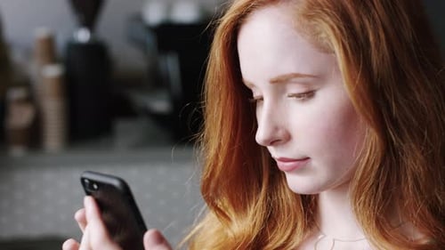 Busines woman, phone and planning startup schedule in coffee shop, cafe or Sweden restaurant