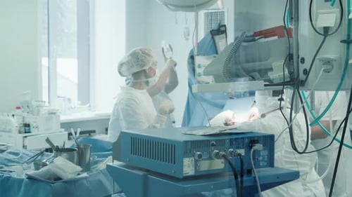 Doctor and Team Perform Surgery in Clinic