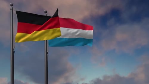 Realistic Waving Germany And Luxembourg Flags