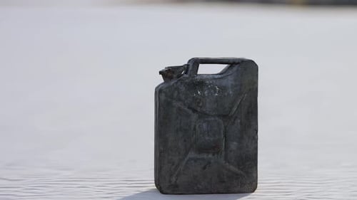 Old Rusted Fuel Can on the Beach