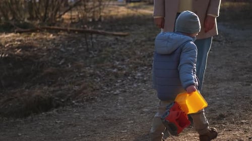 Happy Baby Child Outdoor Little Toddler Boy with Toy Car Having Fun on Walk in Park Baby Son Smiling