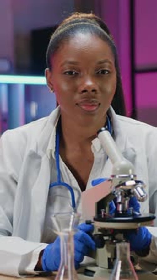 Close Up Portrait of Charming Smiling Confident Qualified African American Woman Scientist in