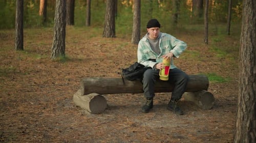 Travel Coffee Routine Calm Moment of Enjoying Hot Drink Amidst Forest Surroundings Serene Camping