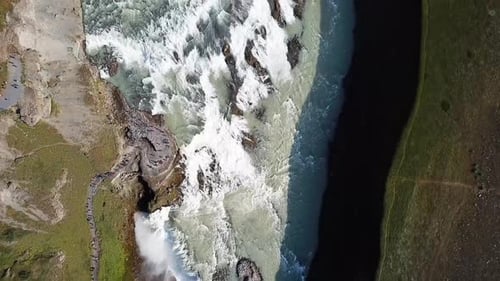 Aerial View of Gullfoss Waterfall's Powerful Cascades in Iceland