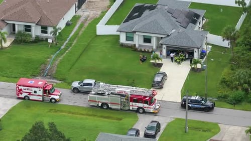 Emergency Service Personnel Responding to Potential Fire Hazard at Florida Home First Responders
