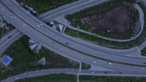 Top View of Cars Drive Along Intersecting Road Outdoors Irrl