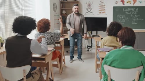 Man Teaching High School Students