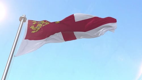 Drapeau de Sercq flottant dans le ciel