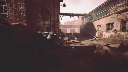 Abandoned Factory with Collapsing Brick Structures Overgrown with Debris