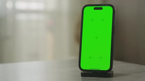 Smartphone Green Screen Mockup on Table