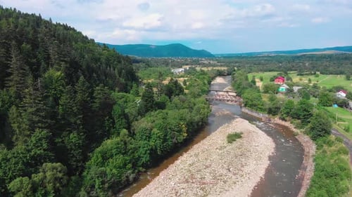 Aerial Video Shooting in Nature Among Mountains Rivers and Green Forests