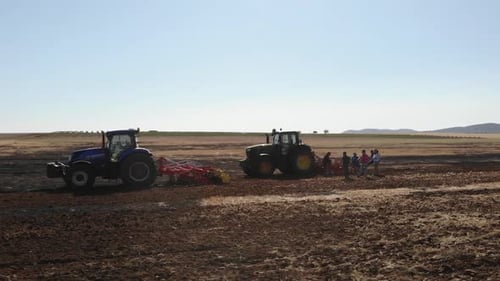 Tractor working on the field cultivating soil in Spain