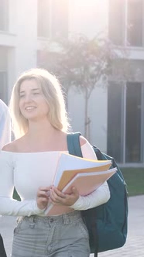 Student Walking to School Carrying Books and Backpack