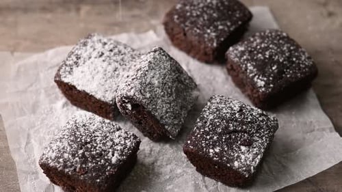 Chocolate Brownies Sprinkled with Powdered Sugar