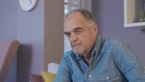 Depressed old man.