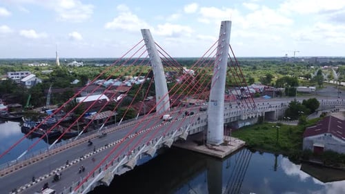 Aerial view of the Sei Alalak Bridge located in Banjarmasin which is known as the first arched bridg