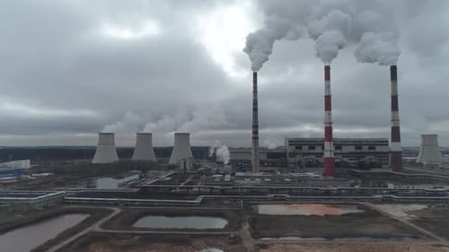Thermal Power Energy Station View From Height to Pipes in Fog Steam and Smoke From Pipes
