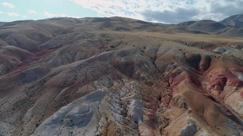Aerial Orbital View of a Beautiful Rainbow Mountains in Altai Region Russia Geological Formation