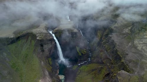 Explore the Breathtaking Haifoss Canyon and Stunning Waterfall in Icelands Wild Landscapes
