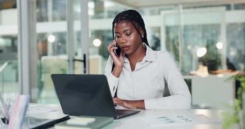 Black woman, talking or phone call in office with laptop, professional or discussion