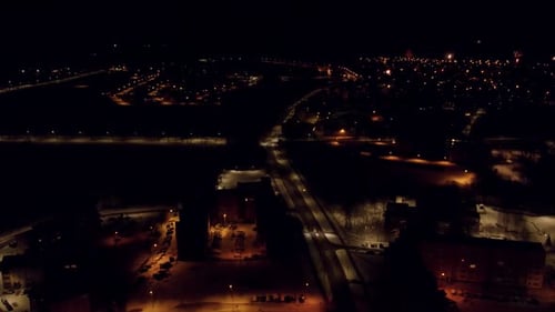 Fireworks in the city to welcome the New Year. Flying through the small town of Valmiera.