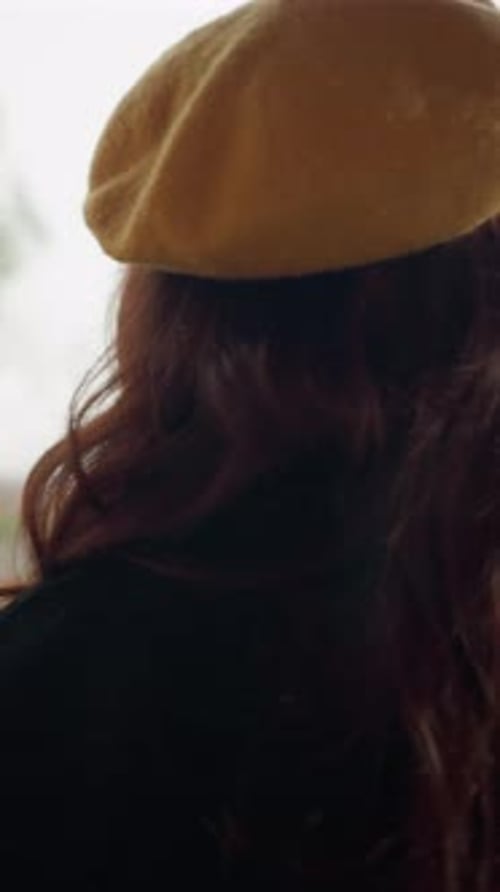 Woman with Beret and Scarf Enjoys Autumn Day