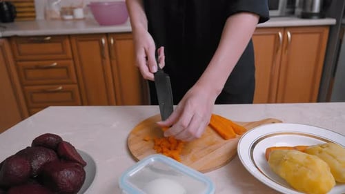 Arranging Freshly Cut Vegetables On Wooden Board For Comforting Family Dish