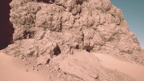Sculpted Rocks Amid Desert Landscape