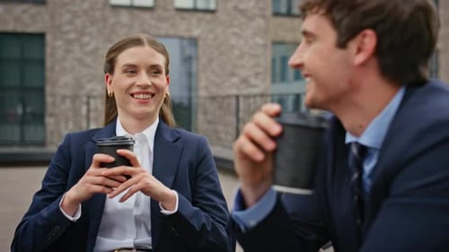 Businesswoman Businessman Sipping Coffee at Meeting at Rooftop Cafe Closeup
