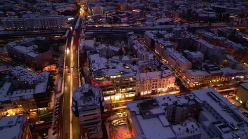 Berlin Steglitz shopping street in Snow at winter evening. Wonderful aerial view drone