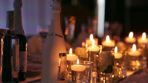 Wedding Banquet Hall Interior Details with Decorated Table Setting at Restaurant Candles and White