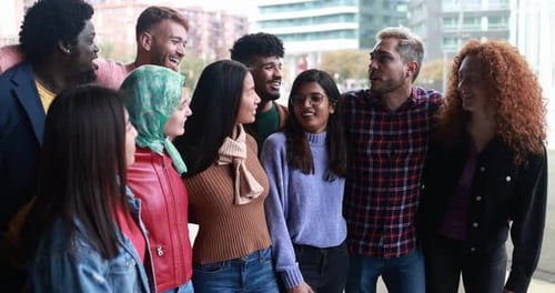 Diverse group of friends smiling in an urban setting