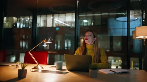 Company Employee Working Evening Office Space Under Lamp Light Serious Woman