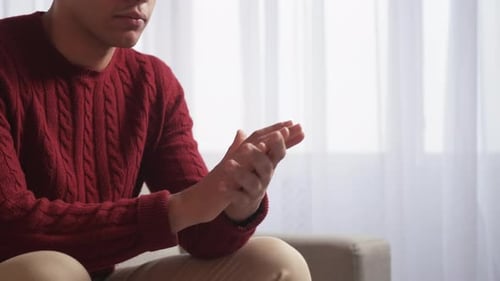 Psychotherapy Session Man Rubbing Hands Smiling