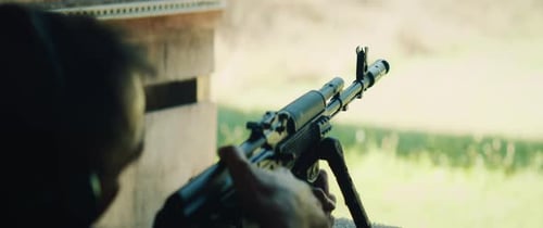 Man Fires Assault Rifle at Outdoor Shooting Range