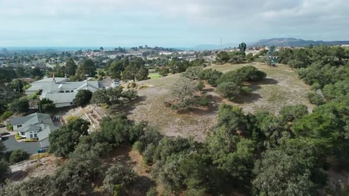 Drone Wide Shot of Suburban Residential Subdivision House in Neighborhood Street California USA